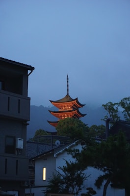 A tall building with a tower in the background