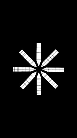 A black and white photo of a cross on a black background