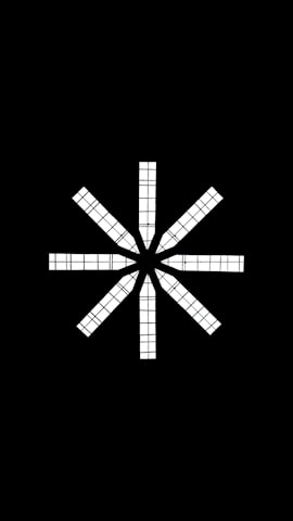 A black and white photo of a cross on a black background