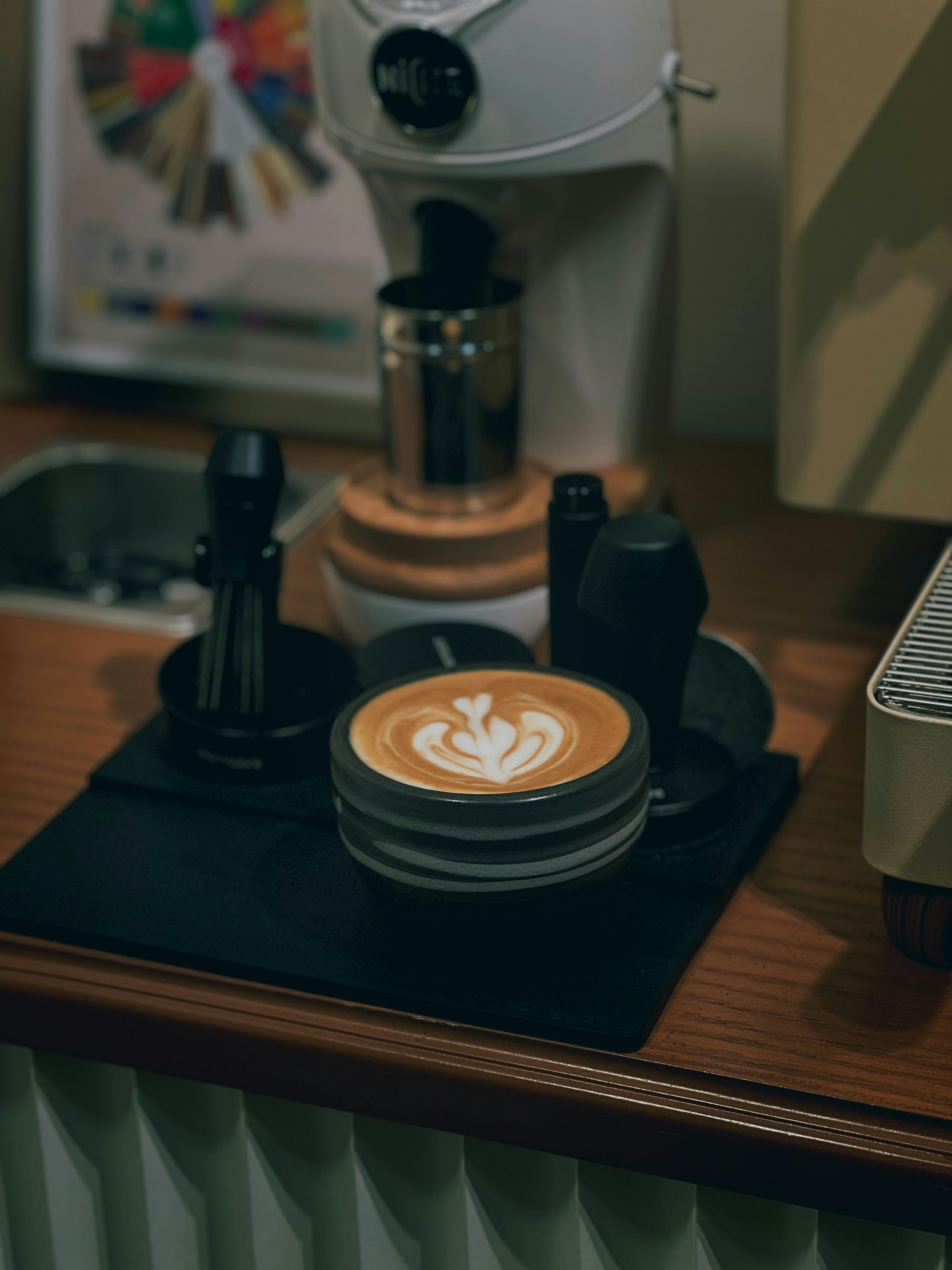 A cup of coffee sitting on top of a counter