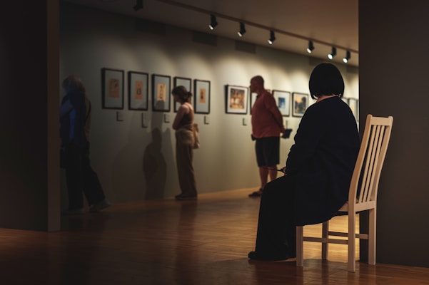 A person sitting on a chair in a room