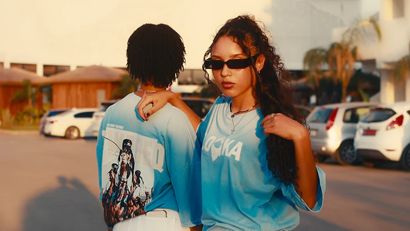 stylish people standing on a city street