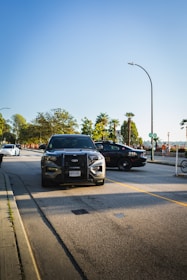 A police car parked on the side of the road