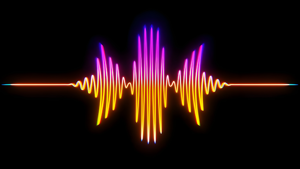 A colorful sound wave on a black background