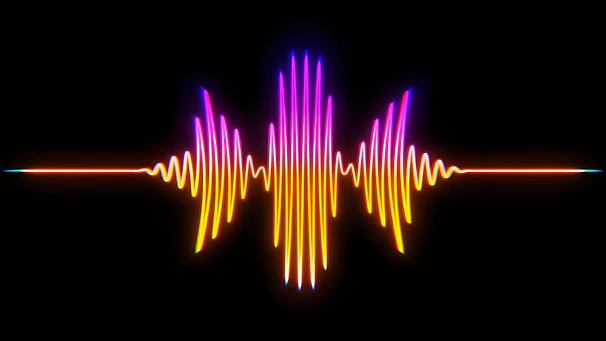 A colorful sound wave on a black background