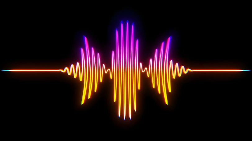 A colorful sound wave on a black background