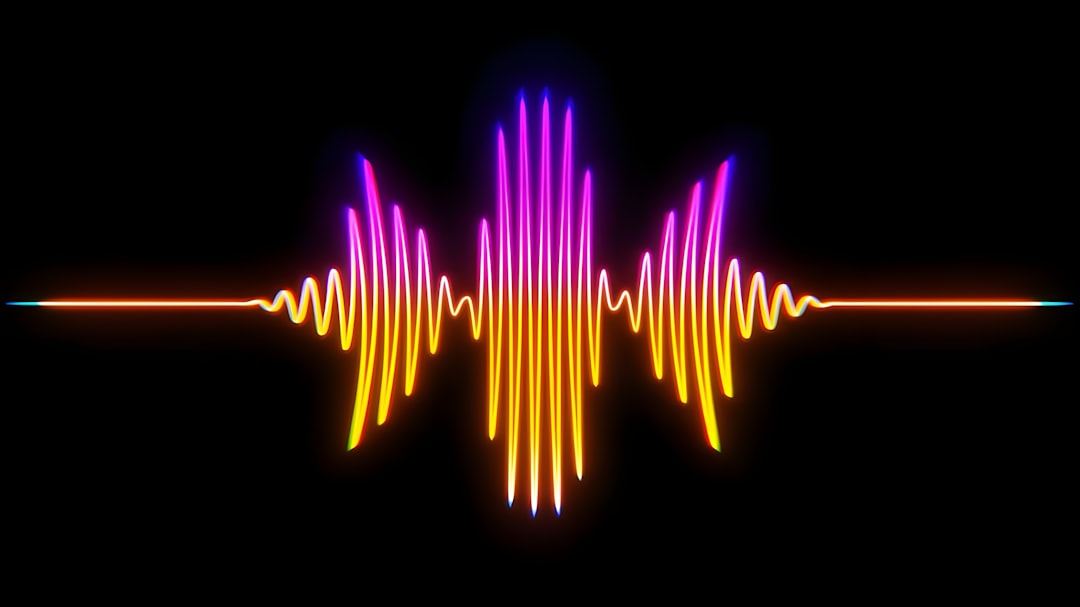 A colorful sound wave on a black background,