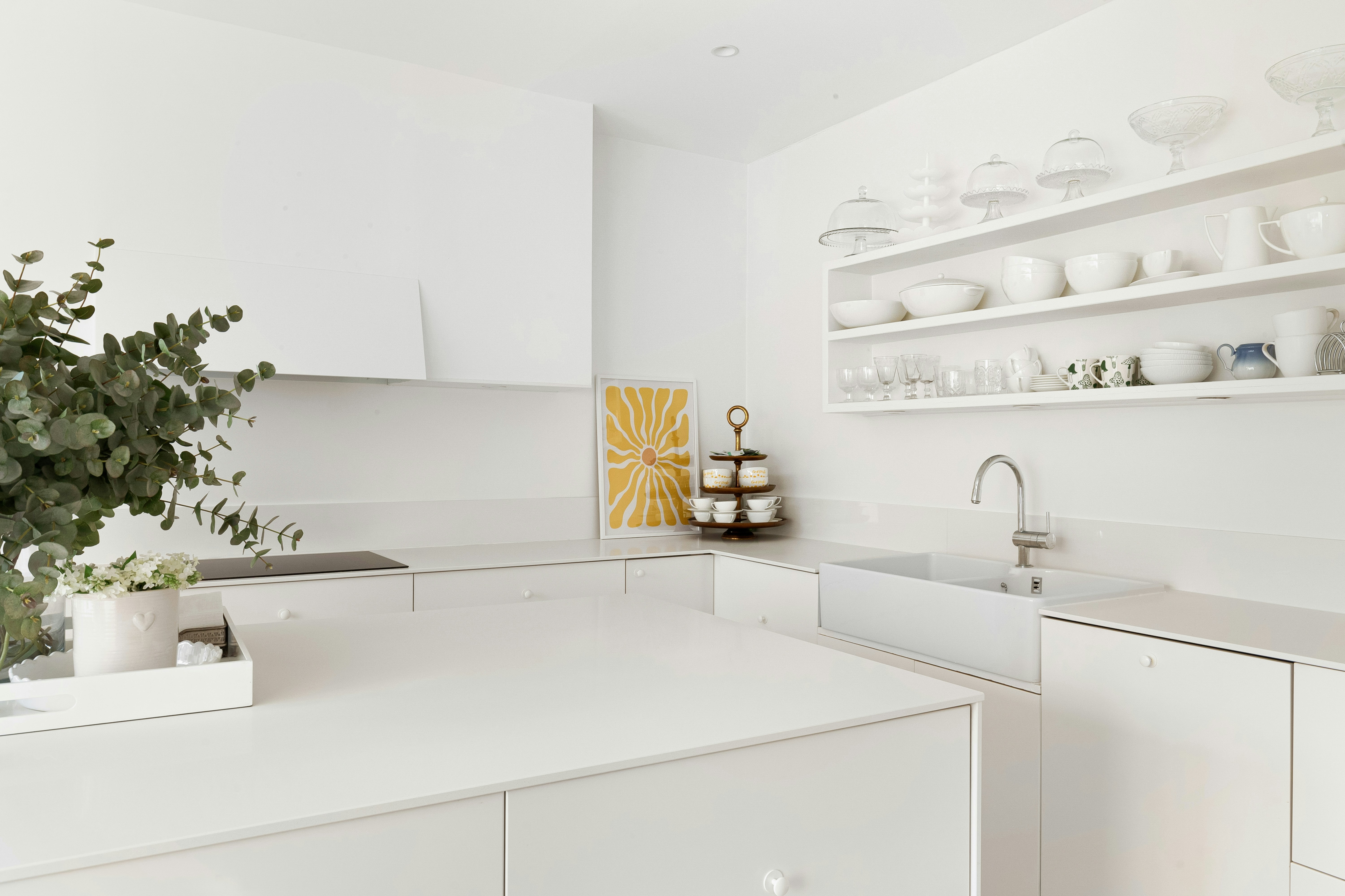 stunning kitchen with freshly painted white cabinets - Charlotte home painters