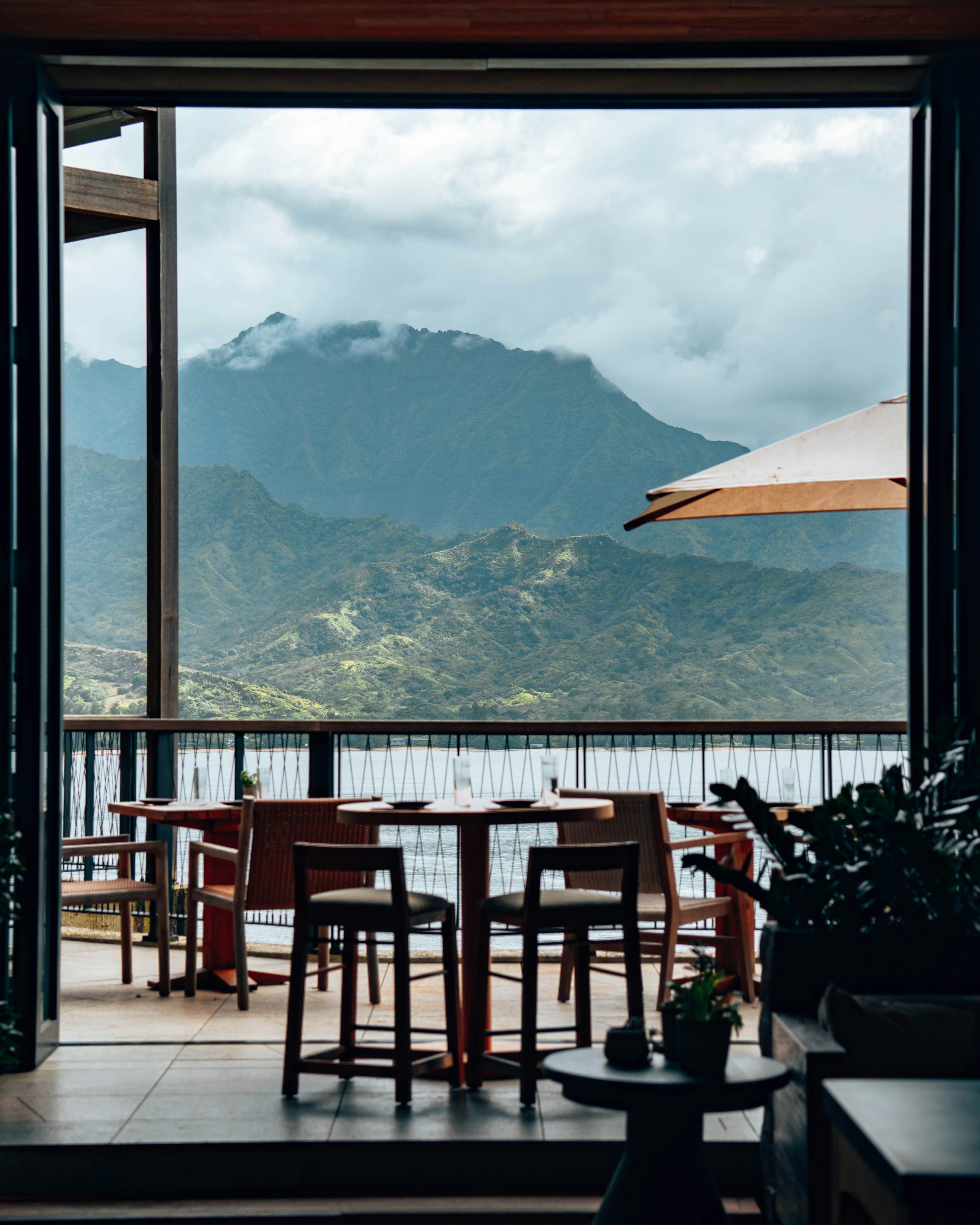 A restaurant with a view of a mountain range