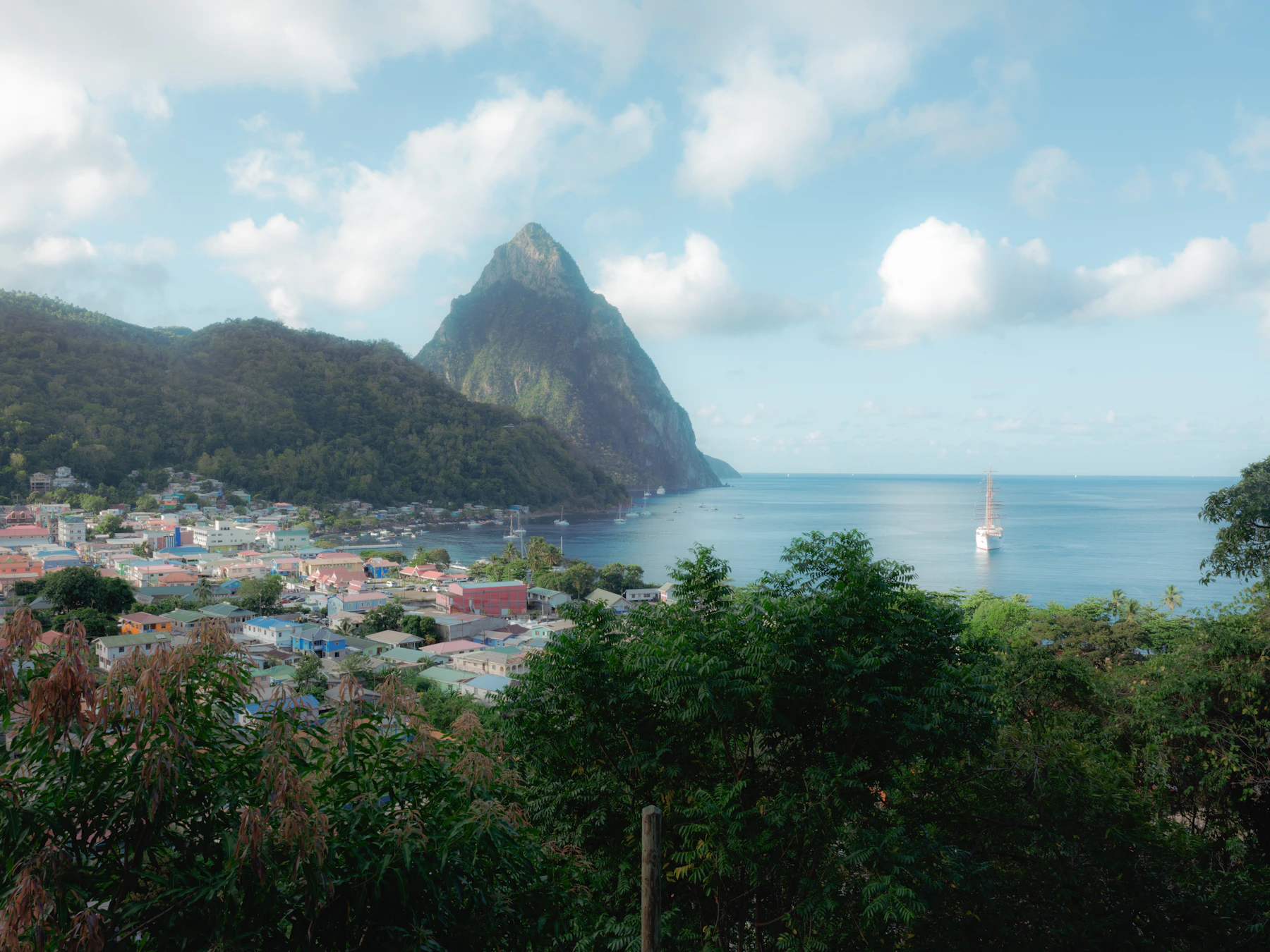 Soufrière town and bay beneath Petit Piton on Saint Lucia's west coast