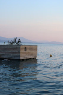 A boat floating on top of a body of water