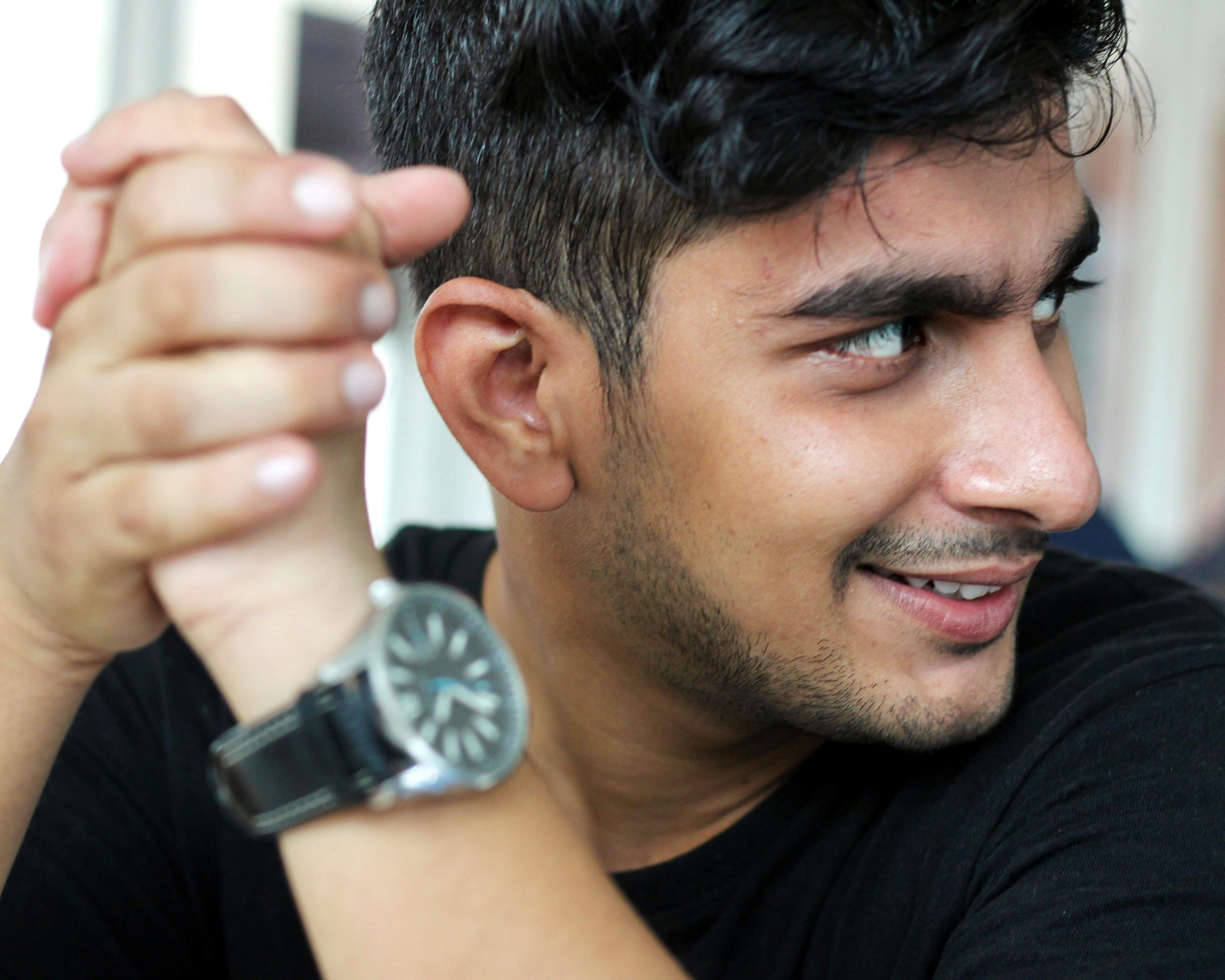 Man with watch on wrist during breakup photography