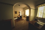 A room with a desk and a chair in it