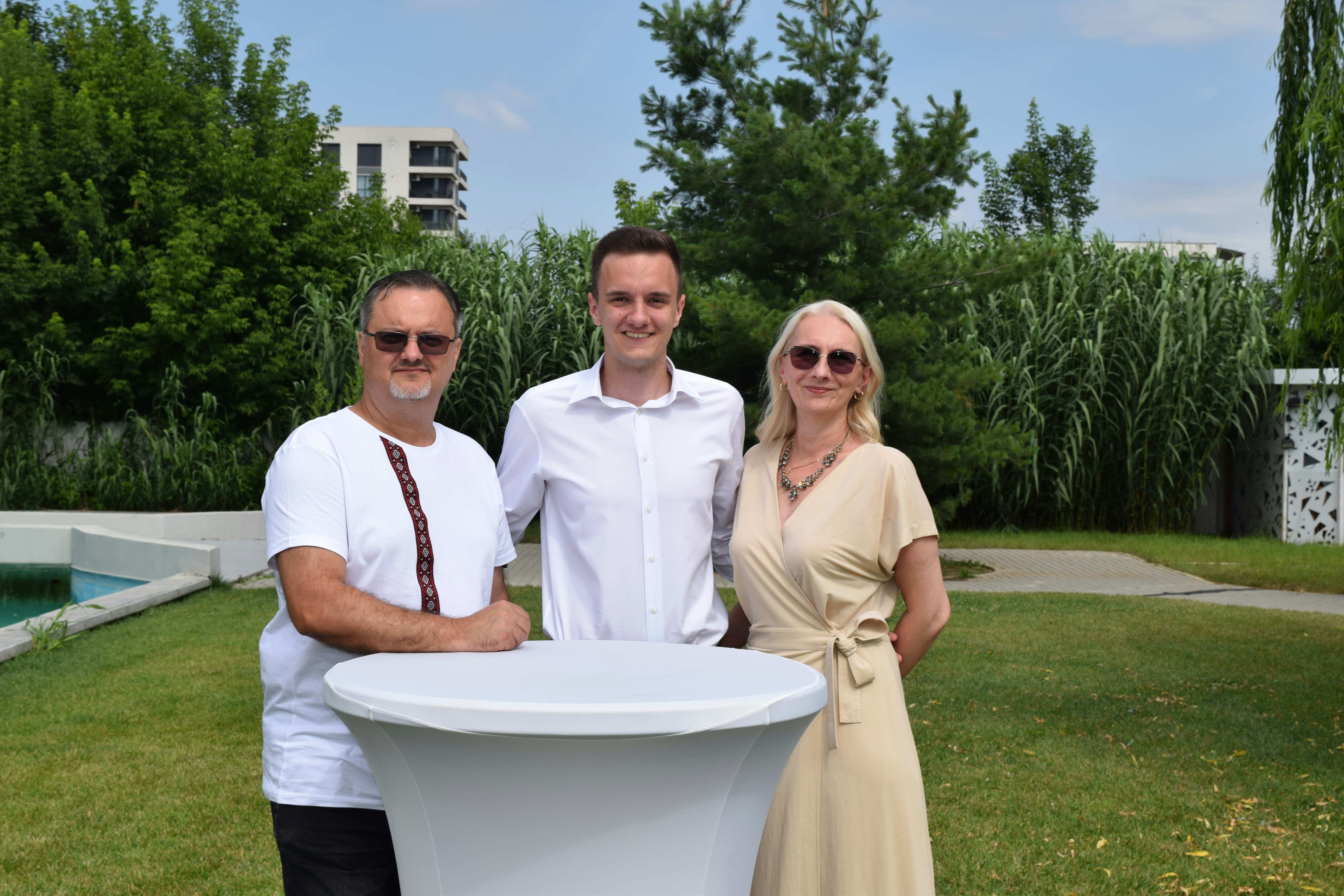 A group of people standing next to each other