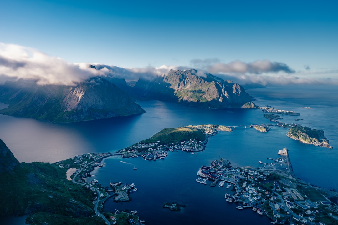 An aerial view of a city and a body of water,