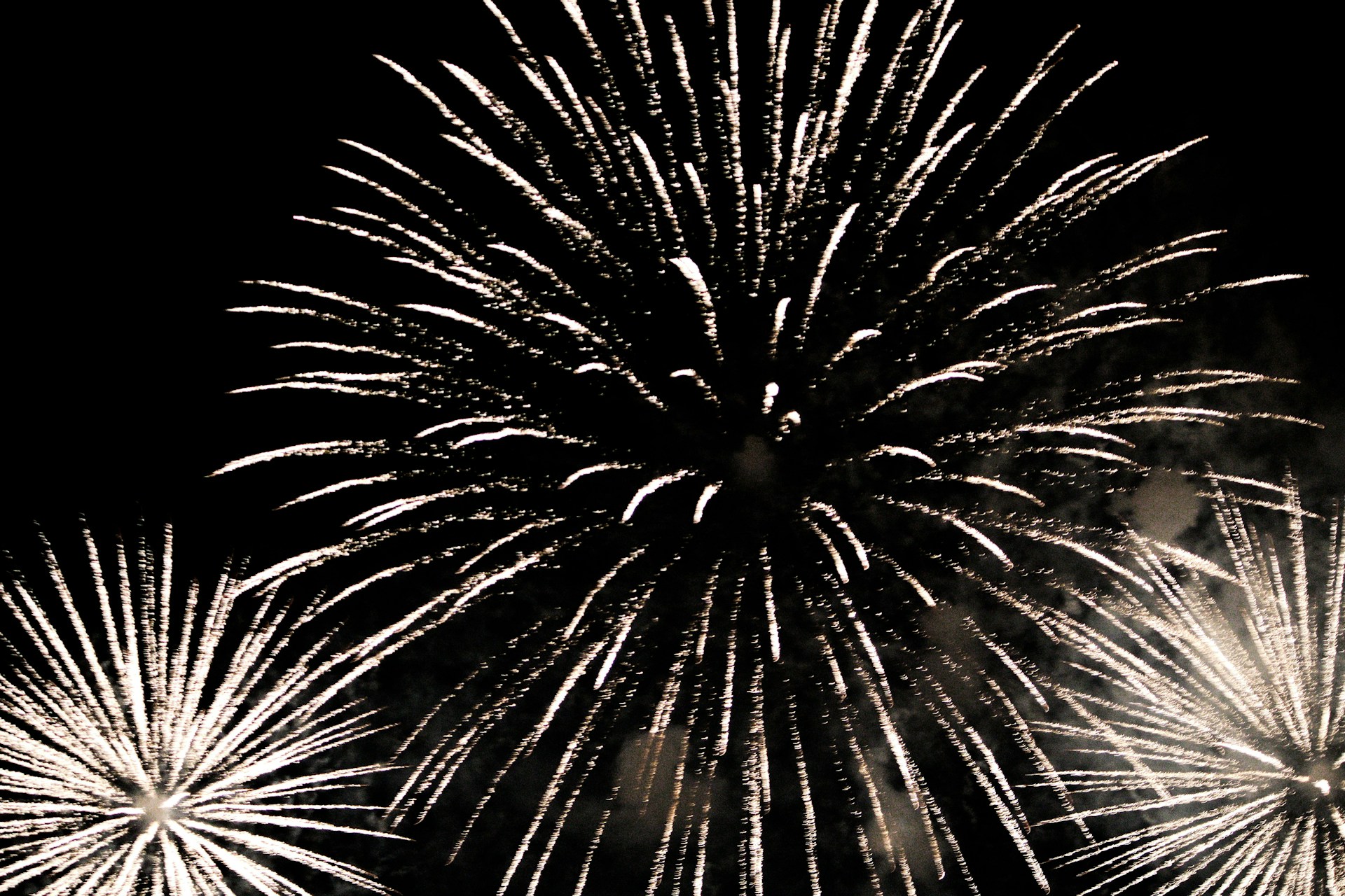 A black and white photo of fireworks