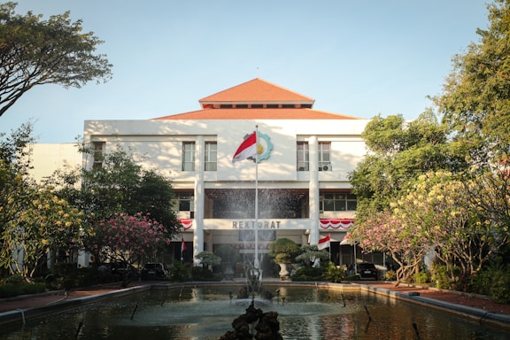 A building with a fountain in front of it