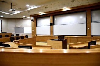 An empty conference room with a projector screen