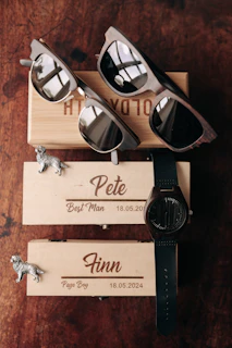 A couple of sunglasses sitting on top of a wooden box