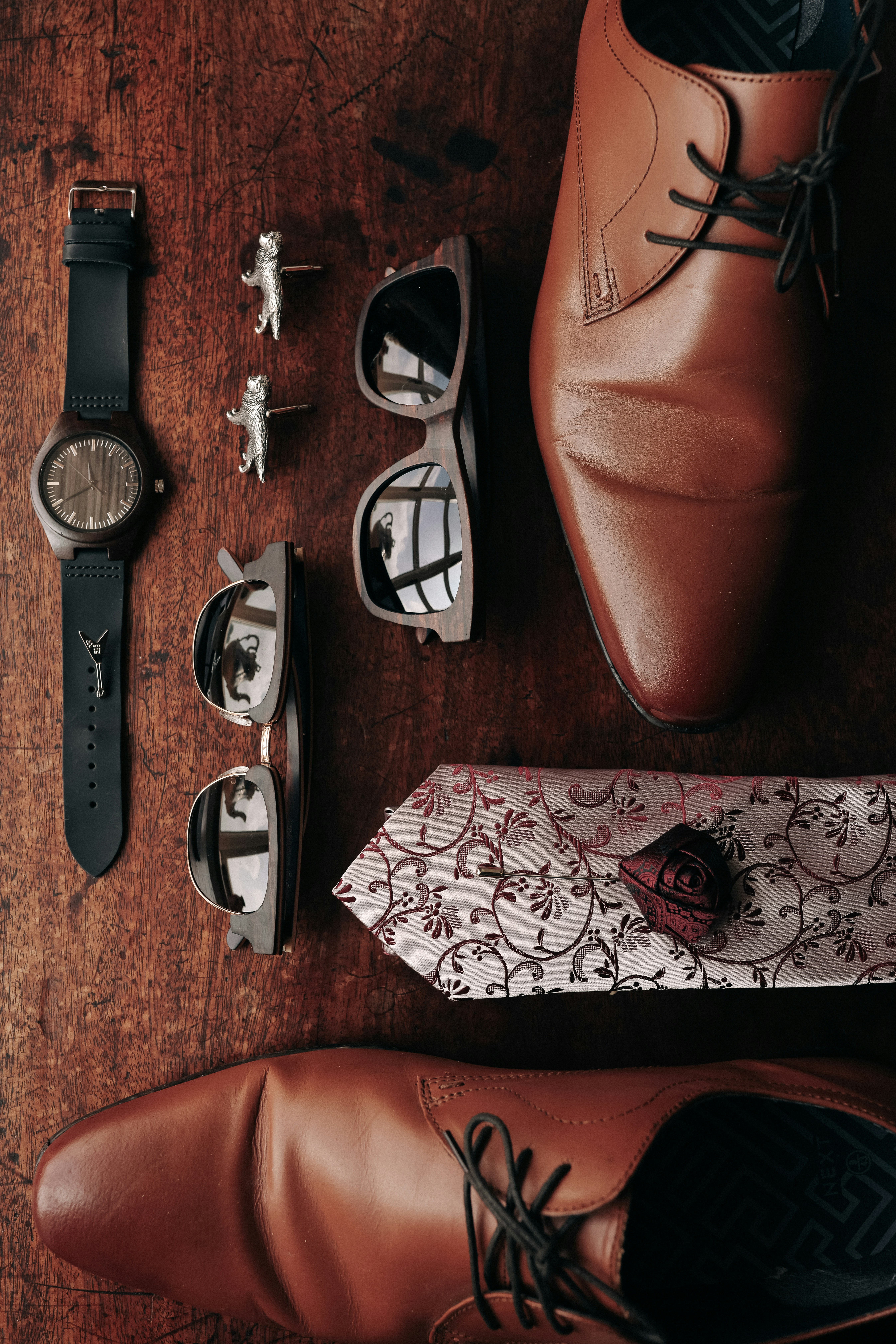 Old Youth Wooden Sunglasses and Watch on a wedding day