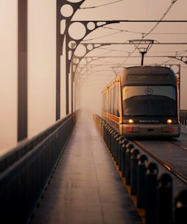 A train traveling down a train track next to a platform
