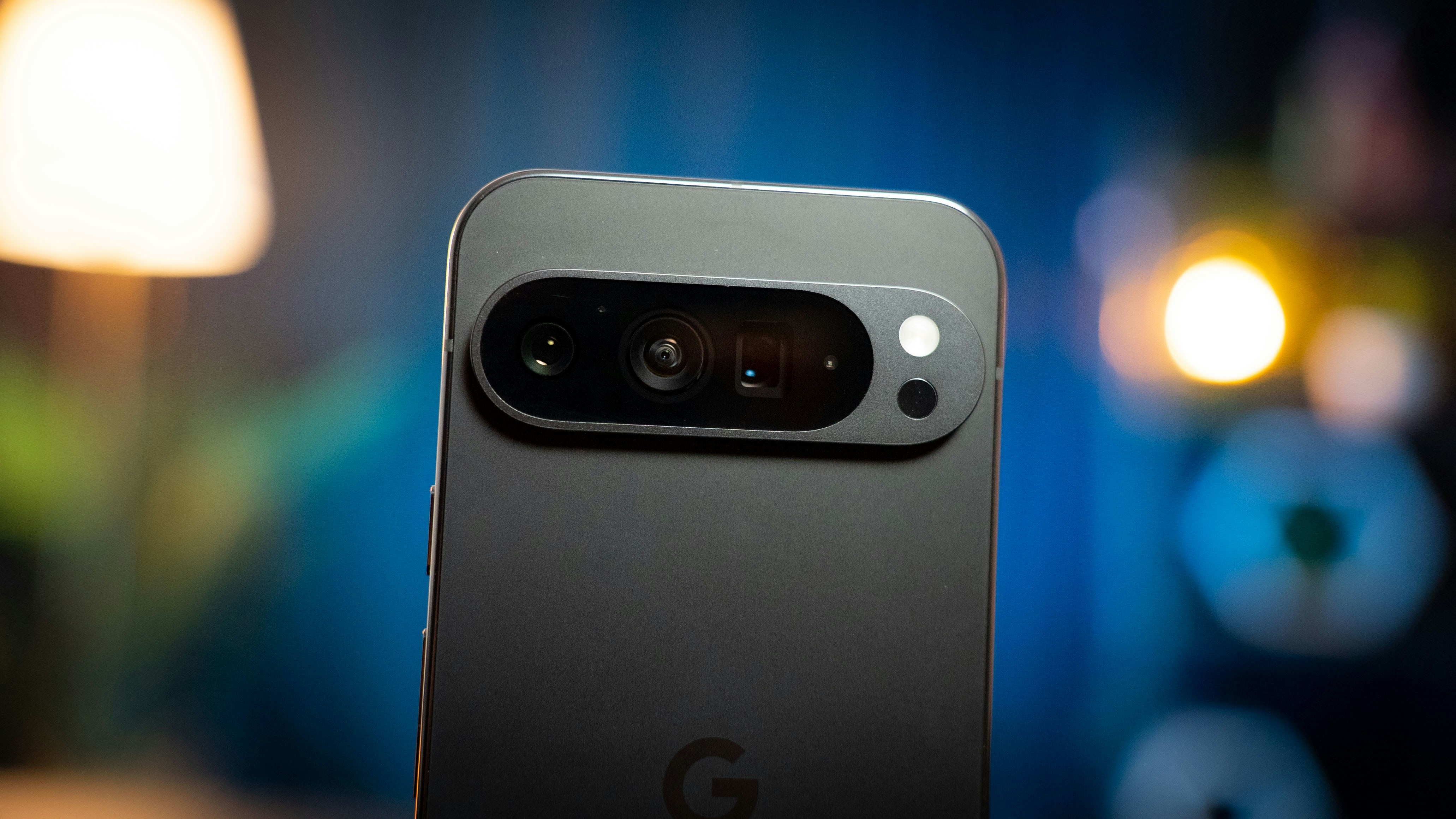 A close up of a cell phone with a blurry background