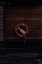 A life preserver on the side of a building