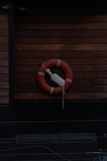 A life preserver on the side of a building