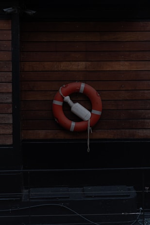 A life preserver on the side of a building
