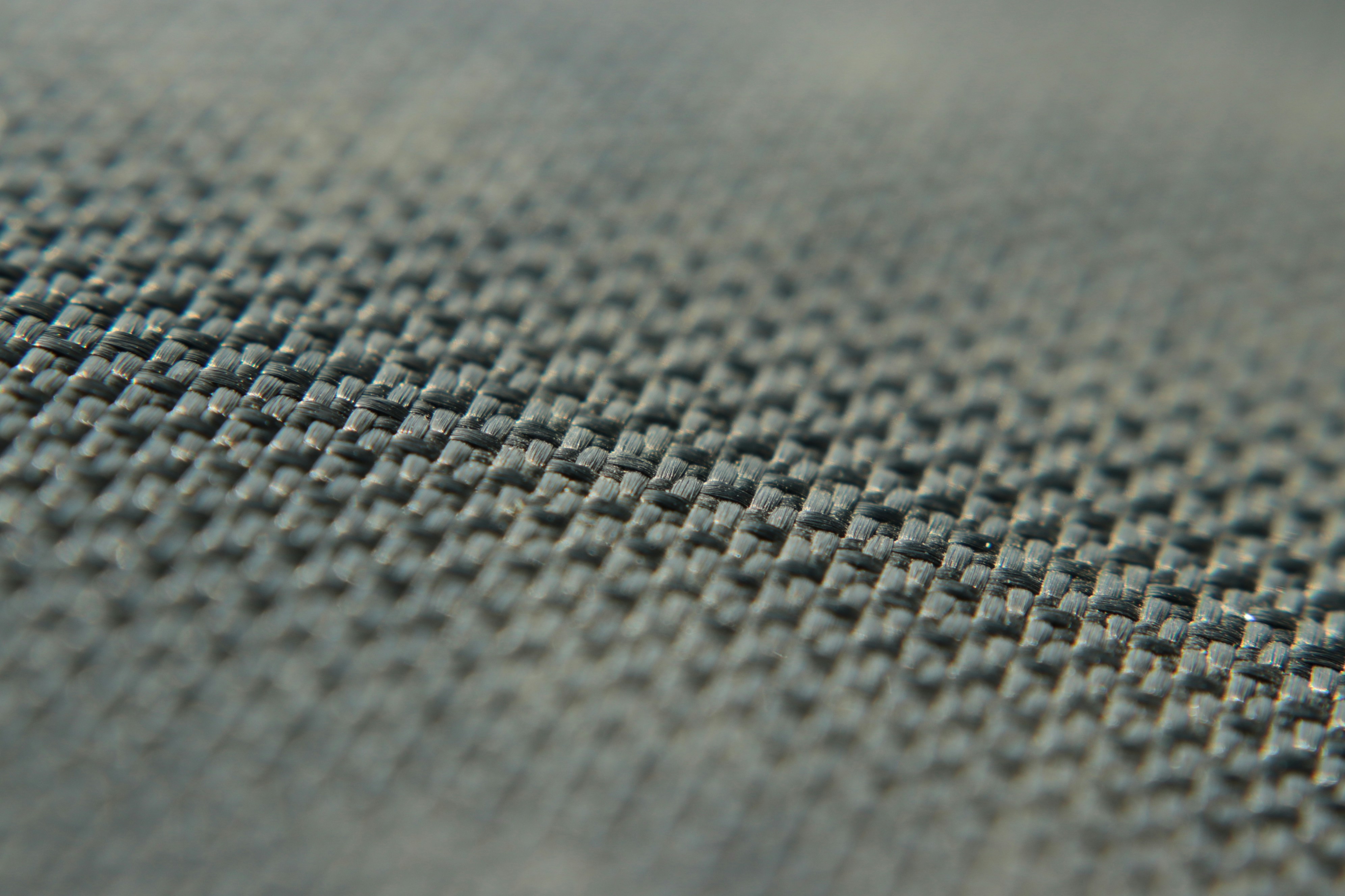 A close up view of a gray fabric