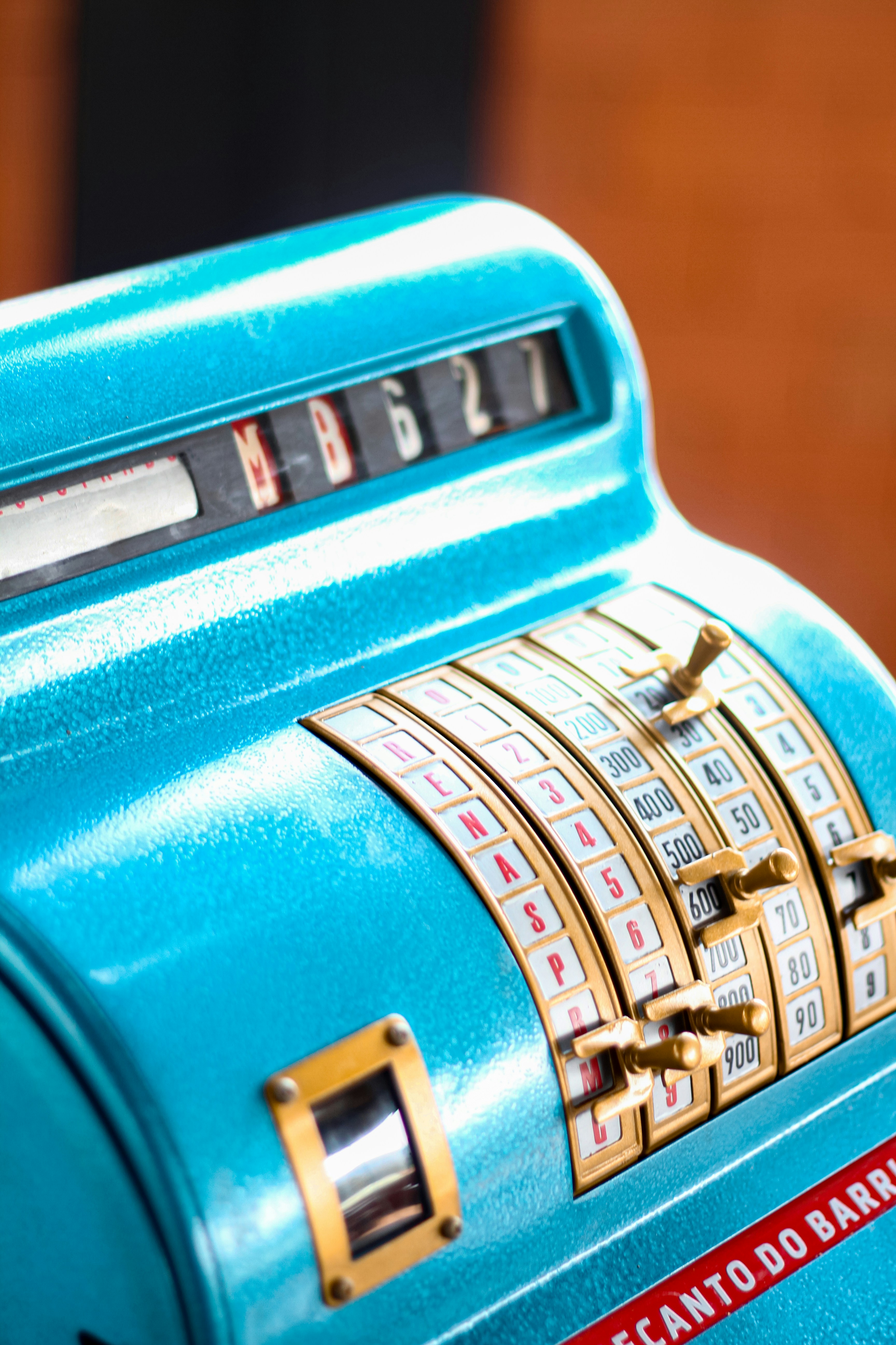 A close up of a blue machine with numbers on it