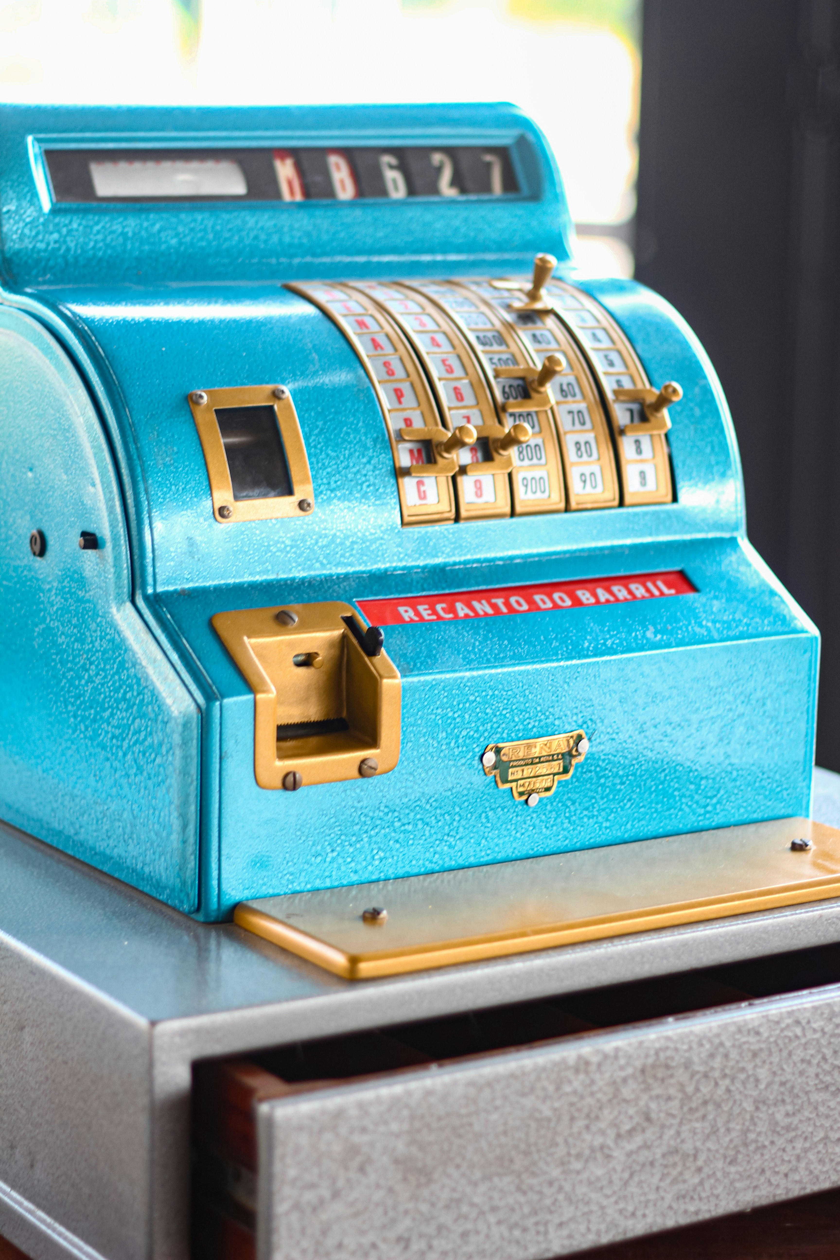 A blue machine sitting on top of a table