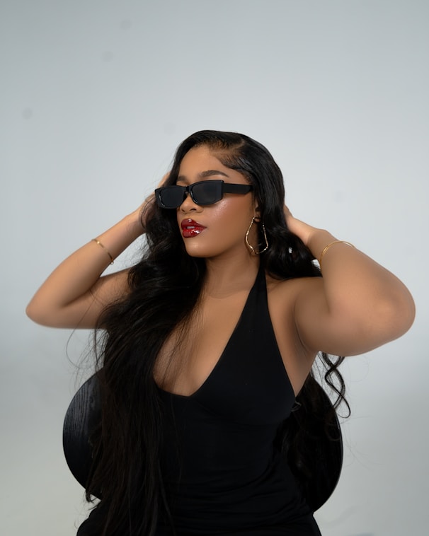 A woman wearing a straight luxury wig