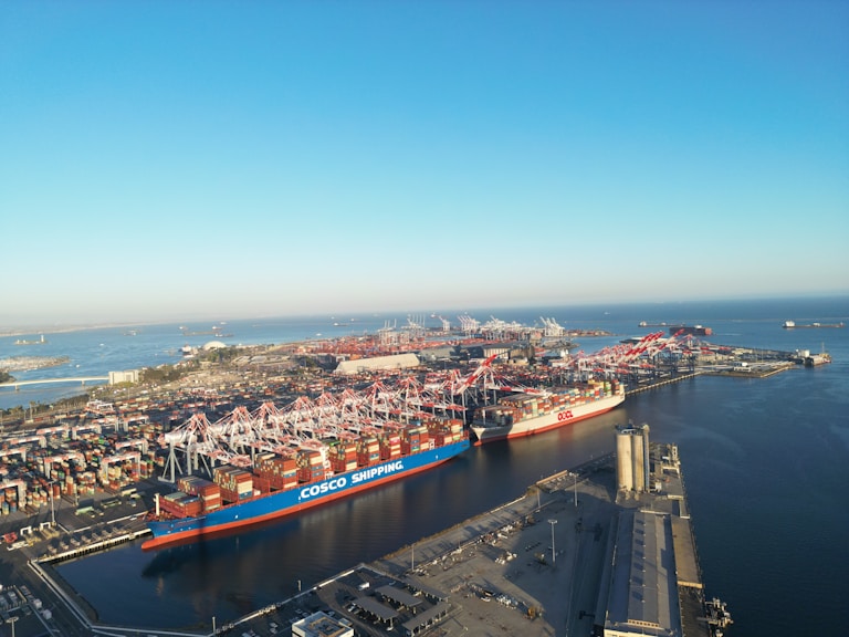 An aerial view of a large cargo ship in the water