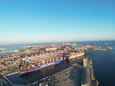 An aerial view of a large cargo ship in the water