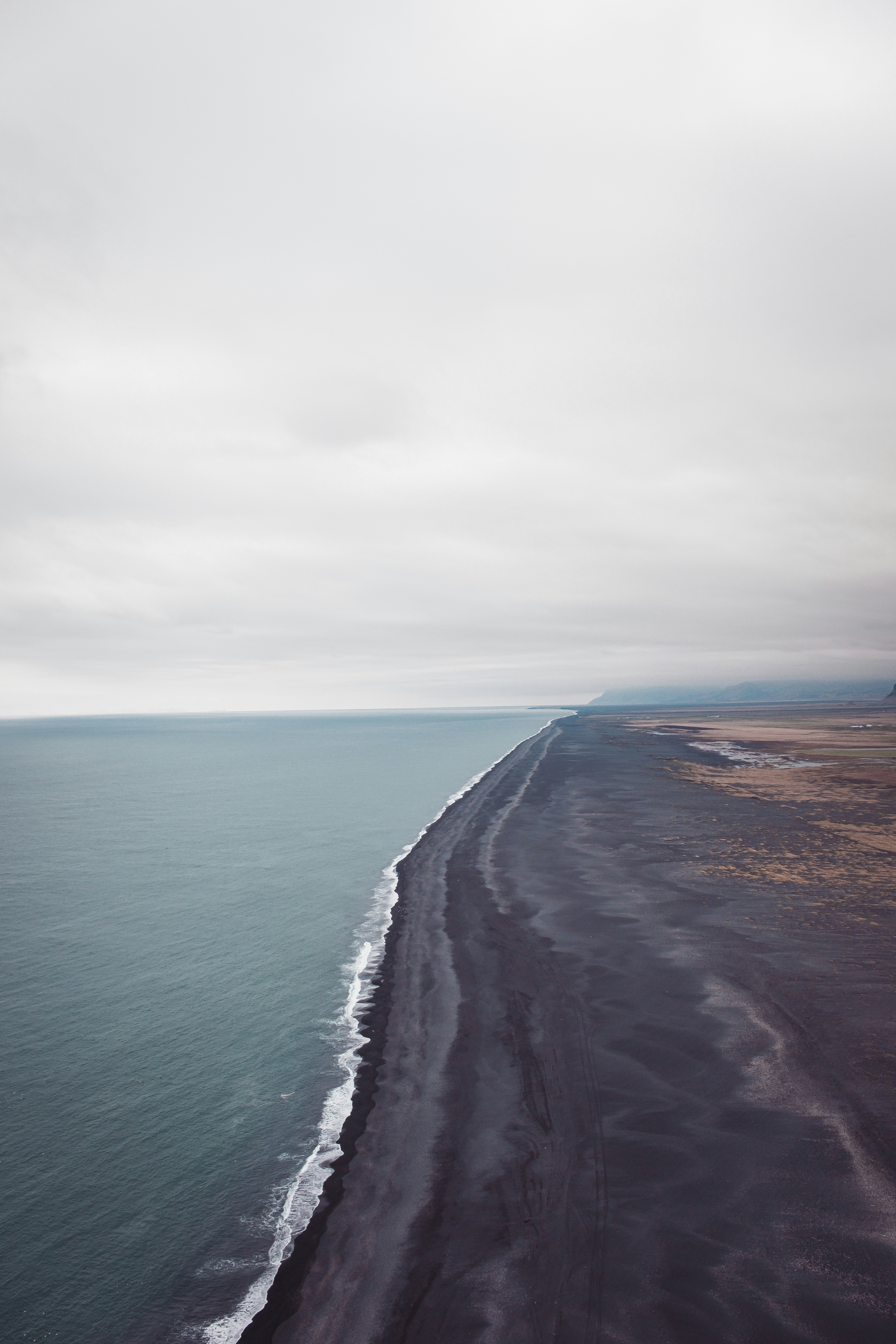 An aerial view of a beach and the ocean