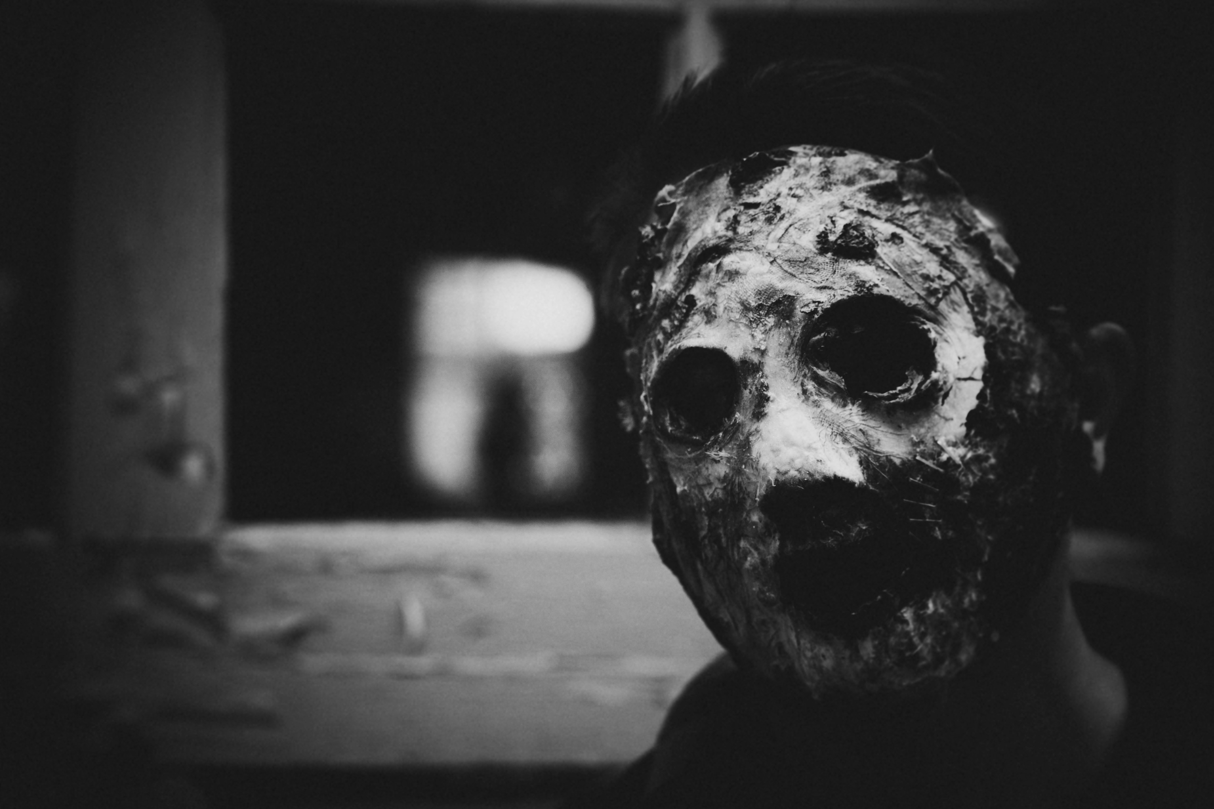 Man with creepy mask