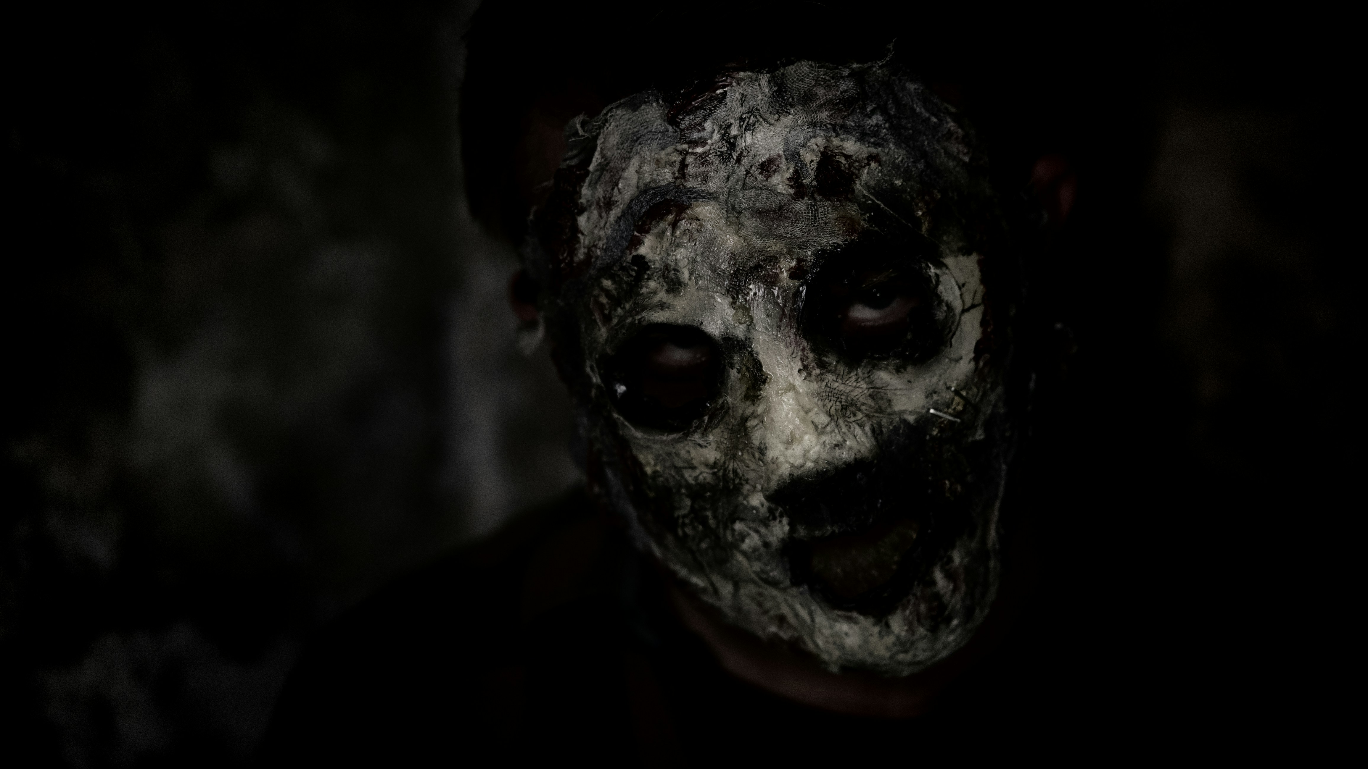 Man wearing white mask