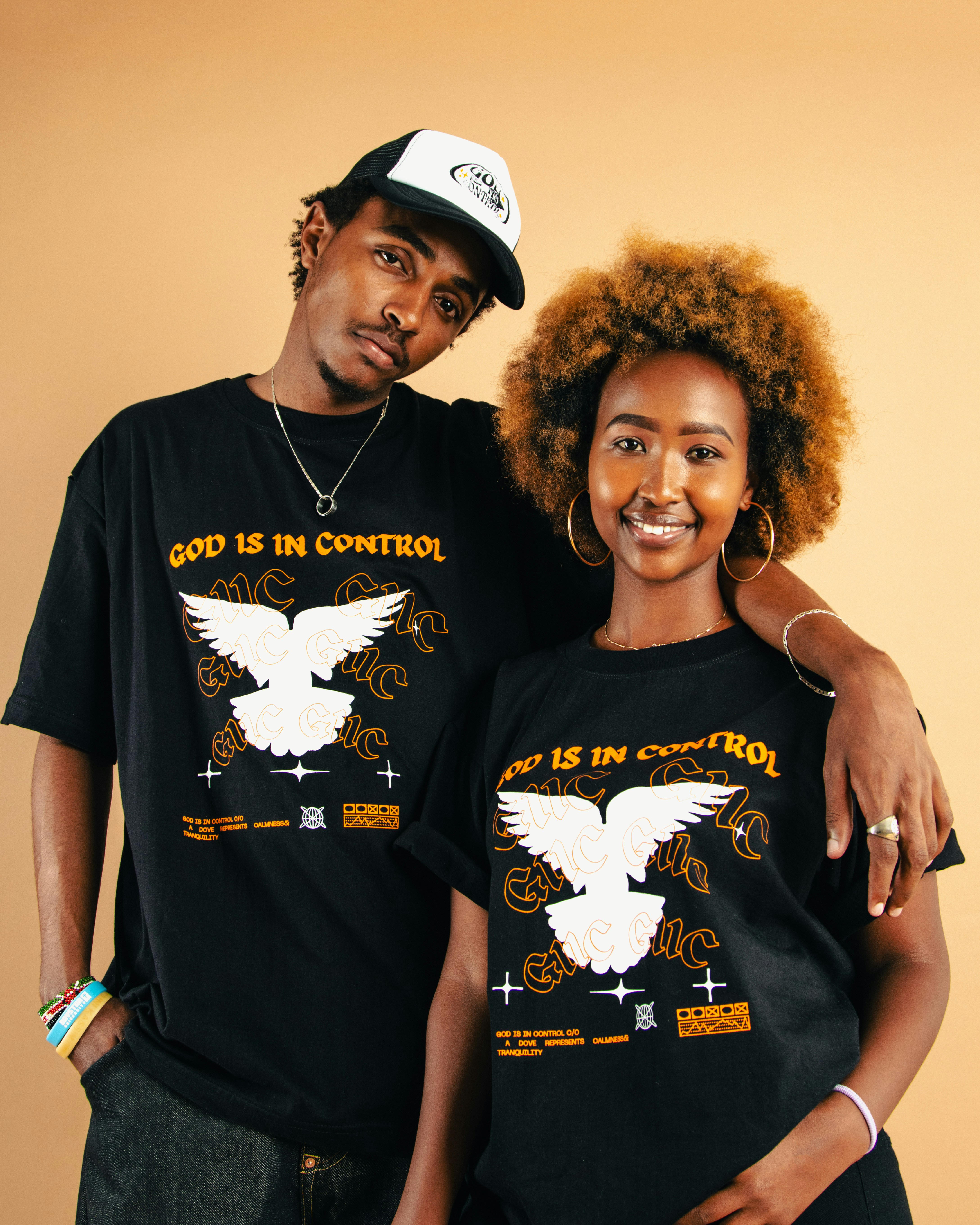 A couple of people standing next to each other