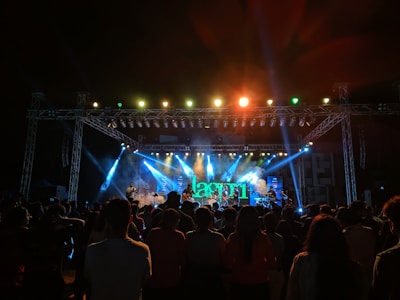 A group of people standing on top of a stage