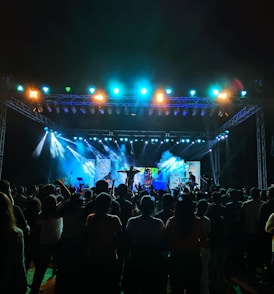 A crowd of people standing on top of a stage