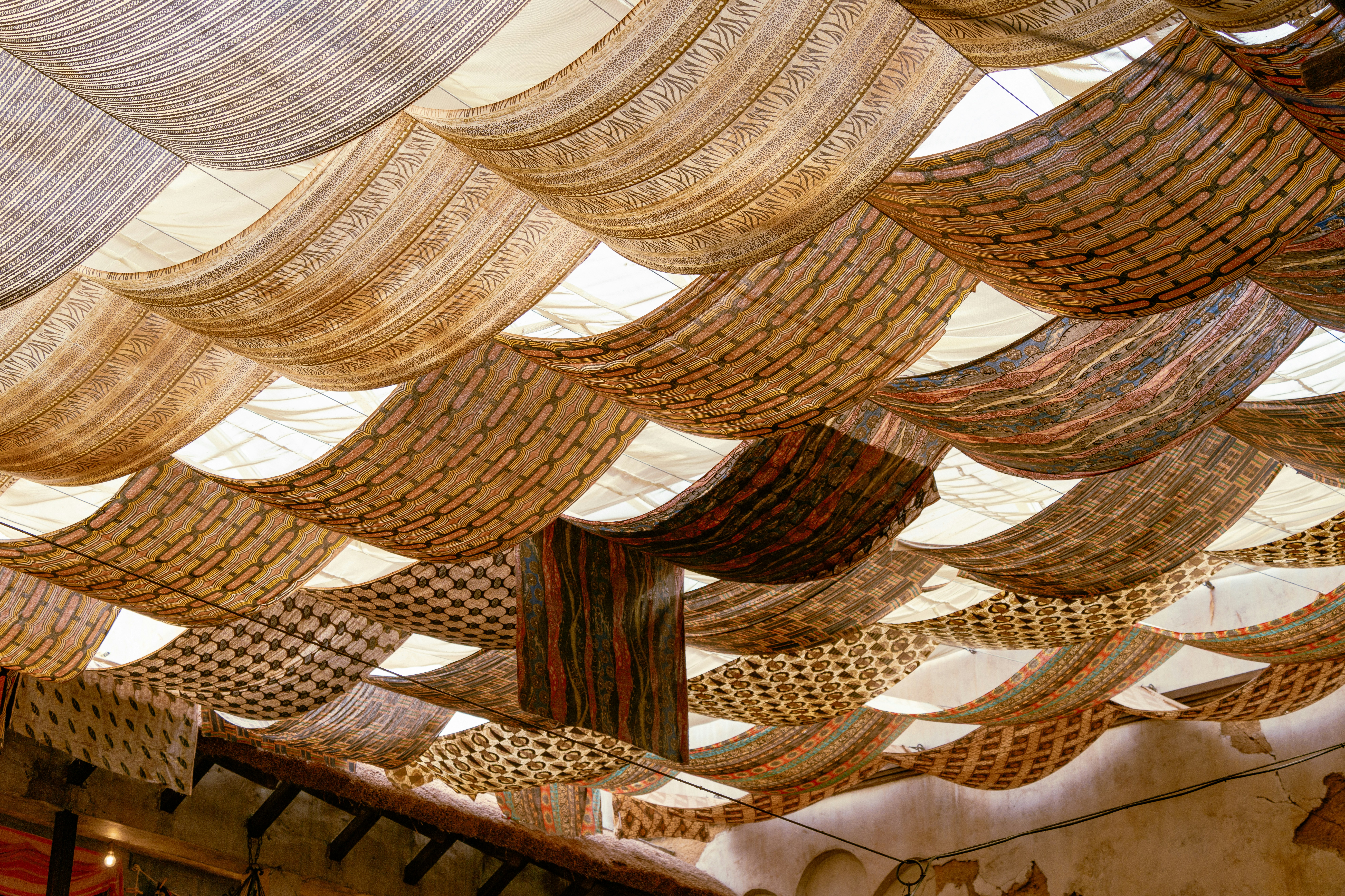 A room filled with lots of different types of curtains