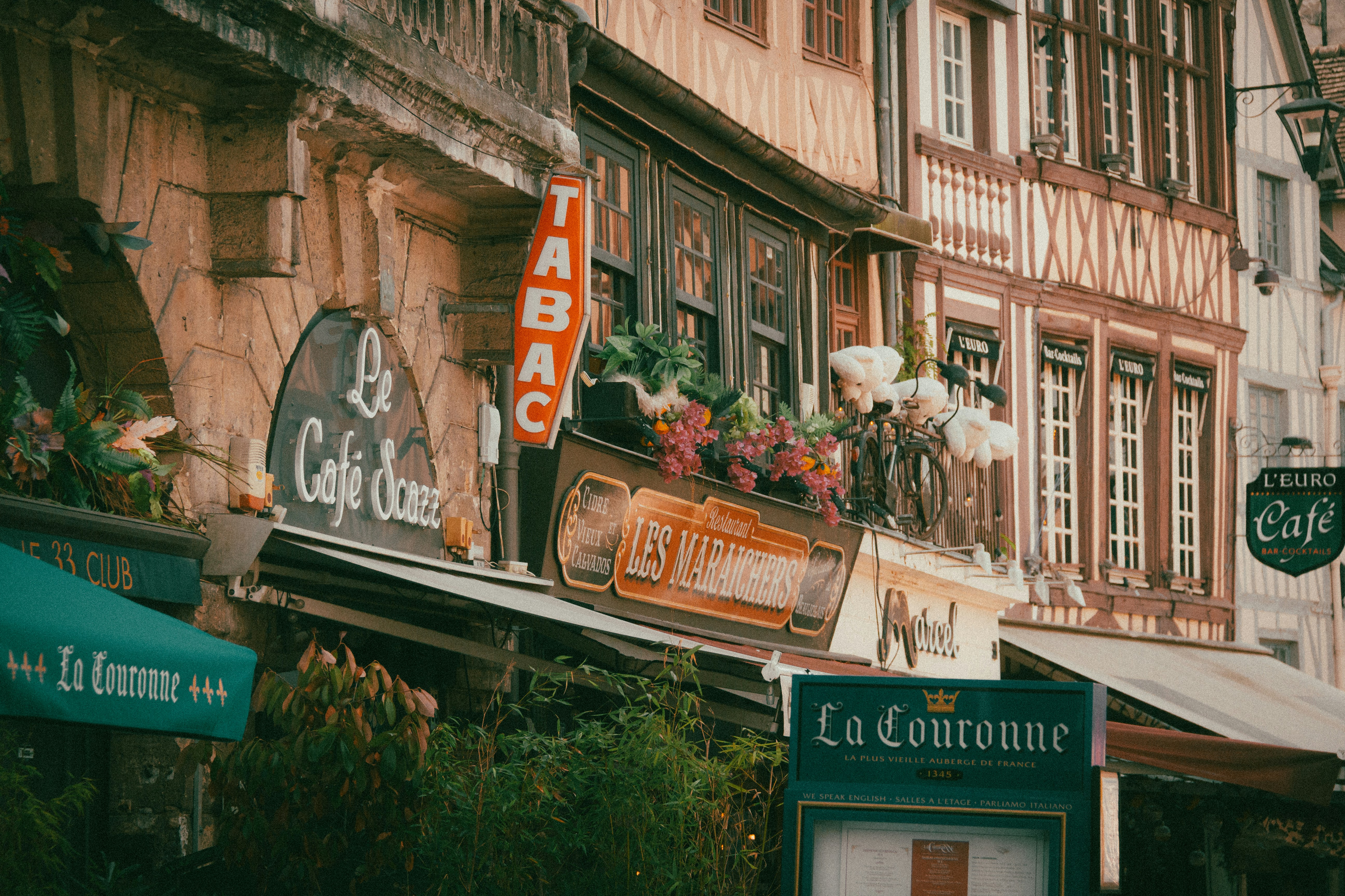 A city street filled with lots of tall buildings
