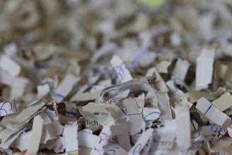 A pile of shredded papers sitting on top of a table