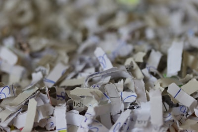 A pile of shredded papers sitting on top of a table