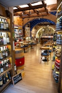 A wine shop with lots of bottles of wine
