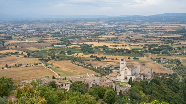A view of a village from a hill — Assisi, Italy
