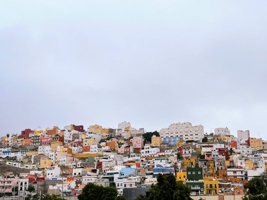 Colourful houses packed up a hillside — Gran Canaria, Spain
