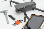 A picture of some tools and a phone