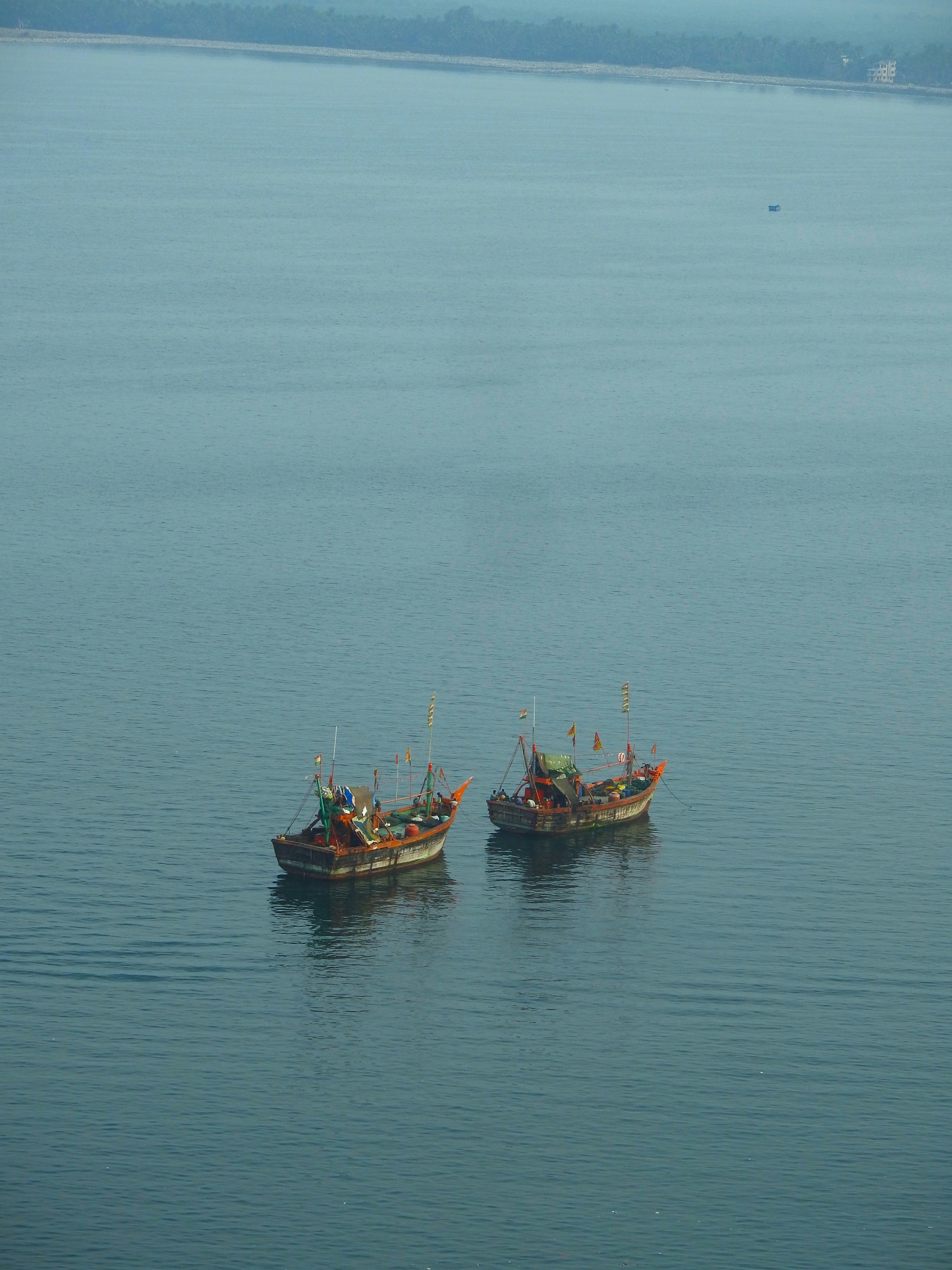 woman wearing yellow long-sleeved dress under white clouds and blue sky during daytime